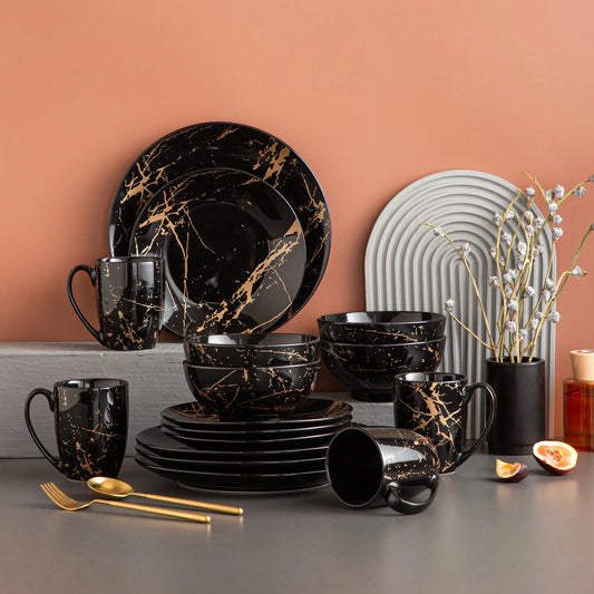 Black Porcelain Dinnerware Set with Elegant Gold Splash Design