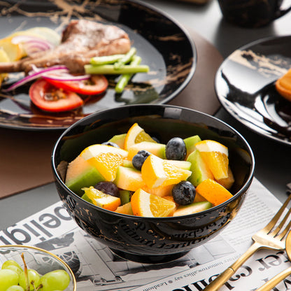 Black Porcelain Dinnerware Set with Elegant Gold Splash Design