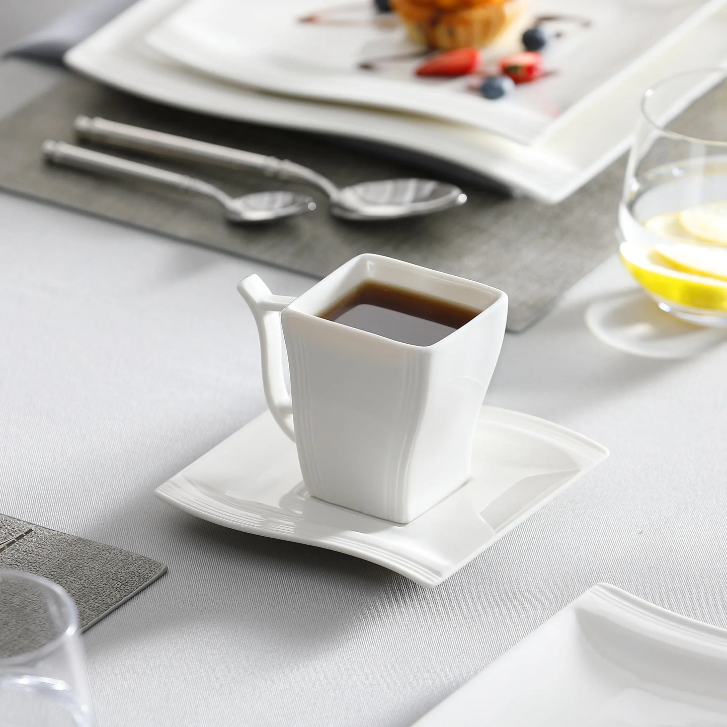 White Porcelain Dinnerware Set with Cups Plates and Saucers